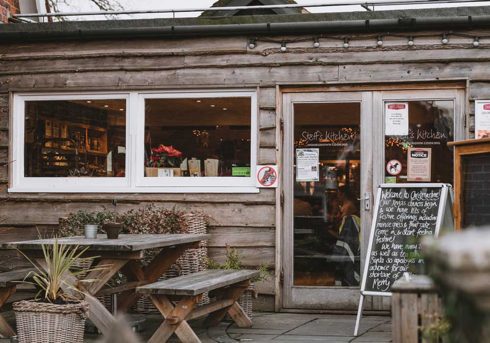 Exterior of a trendy wooden shack restaurant