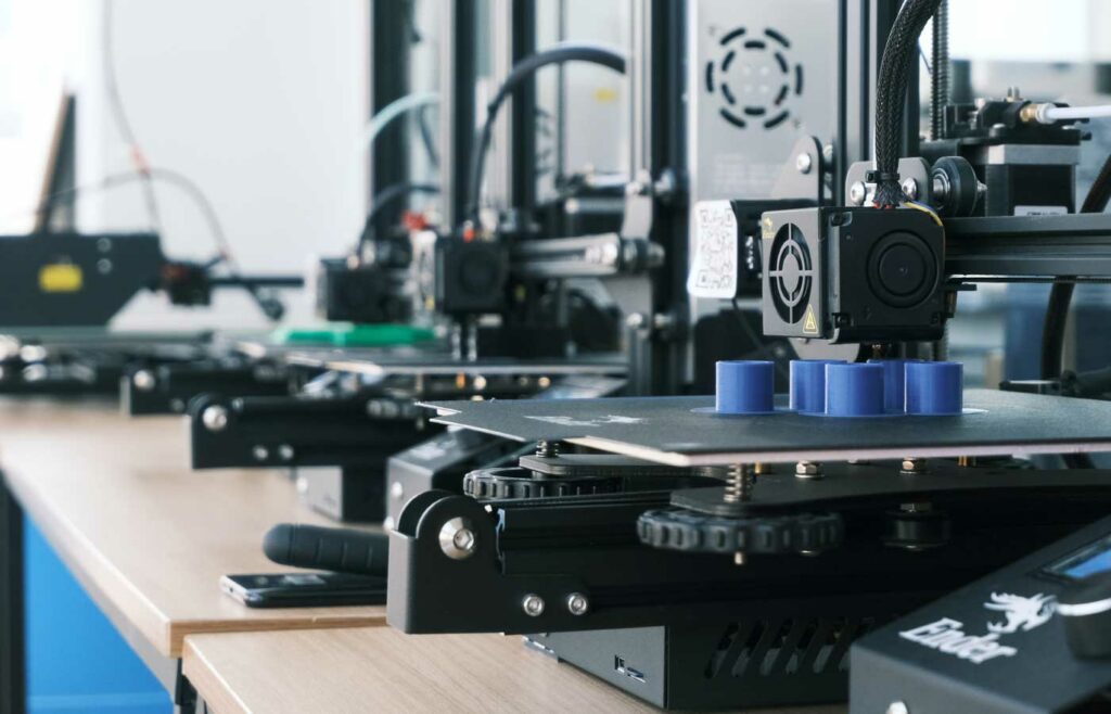 Energy saving business tips - Shows a manufacturing machine on a desk