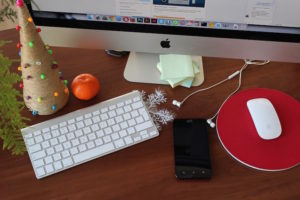 Christmas event insurance - Shows a computer with Christmas decorations