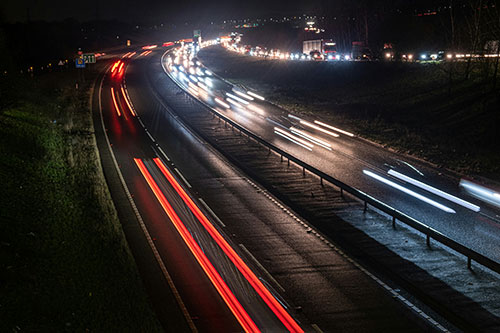 At night picture of a speeding car lights
