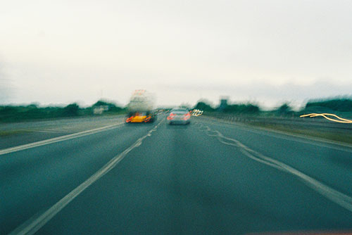 Blurred picture of a car and lorry