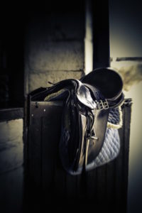 Shows an empty saddle in a stable