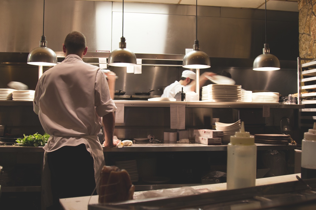 Restaurant Insurance - Shows a chef in a restaurant kitchen