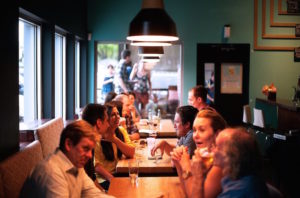 Restaurant insurance quote - Shows a busy table of guests