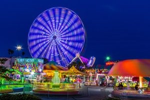 Fairground insurance - Shows a colourful Ferris Wheel