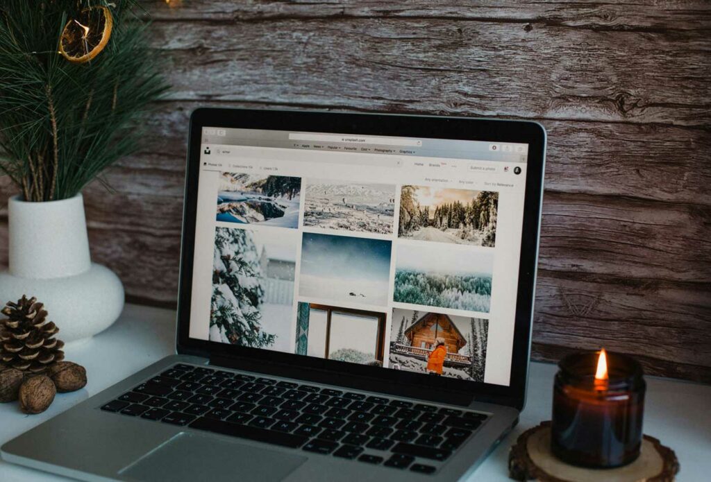 shows christmas decorations and a laptop on a desk - christmas event insurance