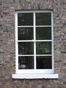 Listed building insurance quote - Shows an old window pane