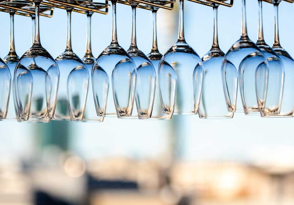 New restaurant opening checklist - Shows a row of hanging glasses