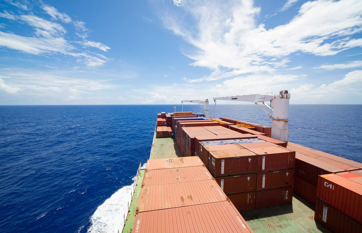 Marine Cargo Insurance - Shows shipping containers on a freight ship