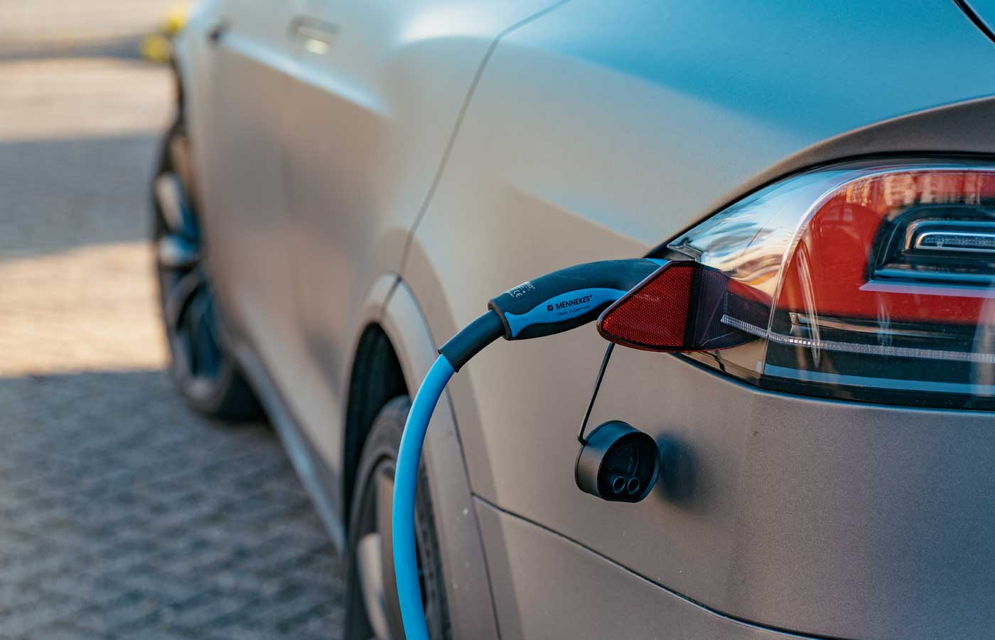 Close-up of an EV charging device - electric vehicle charging station insurance
