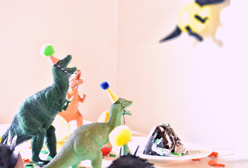 shows an image of toy dinosaurs - childrens party