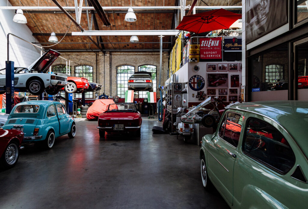 shows an image of cars in a garage - motor trade insurance