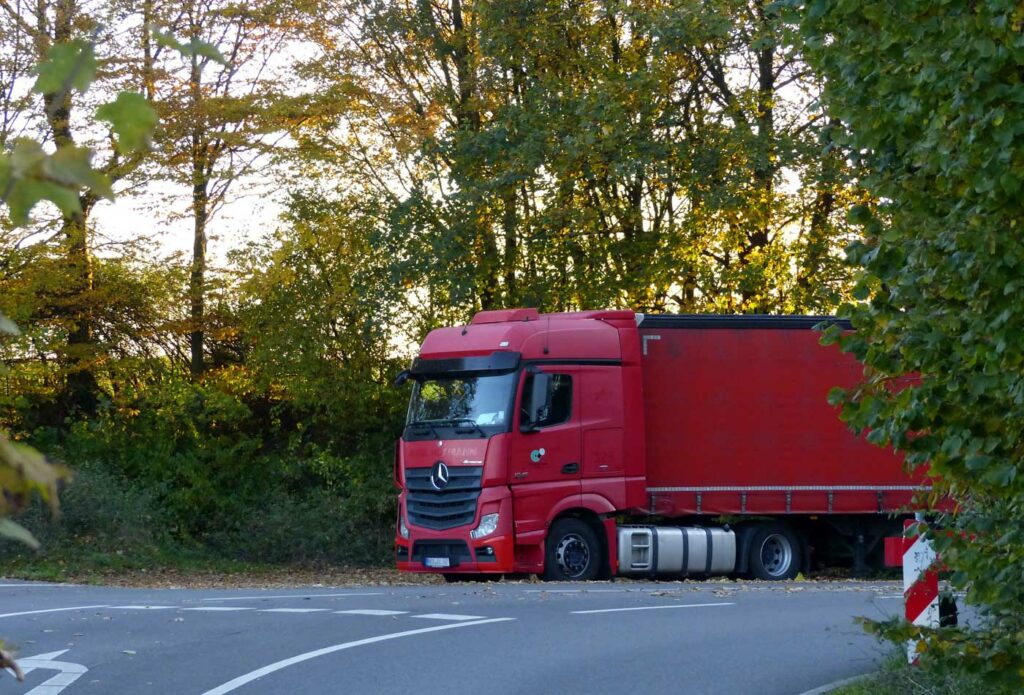 shows an image of a red lorry - Setting up a transport business in the UK