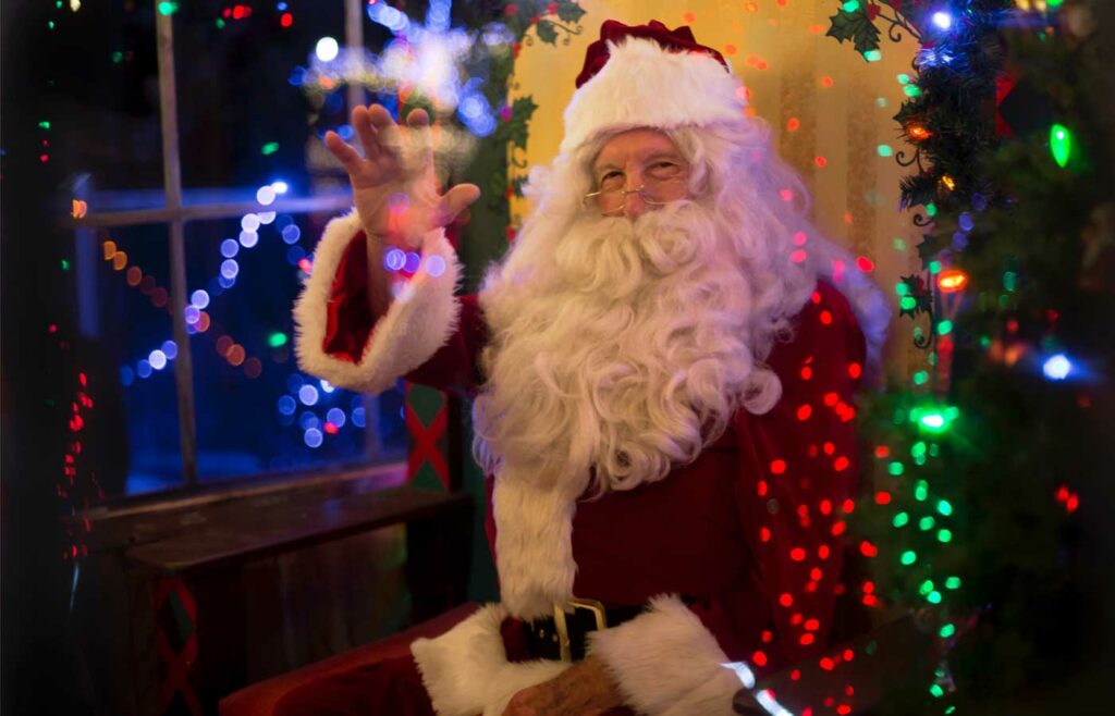 shows an image of santa on a chair - christmas event planning insurance