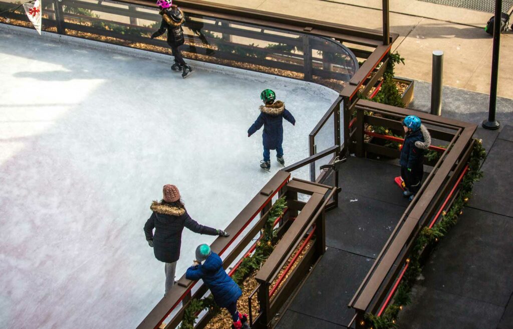 shows an image of children on the ice rink - public liability insurance for a day