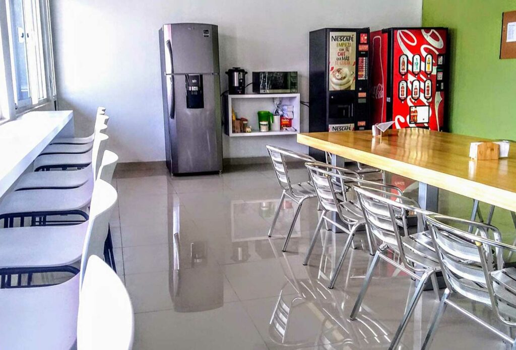 shows a communal kitchen area in a workplace