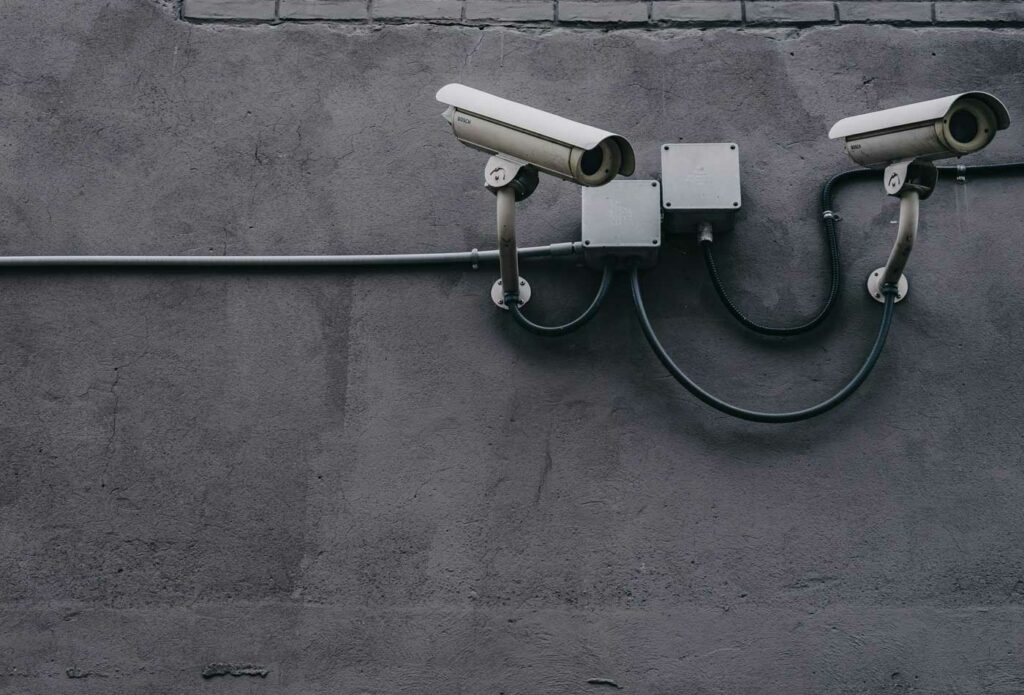 shows a large security camera on a wall - starting a security business