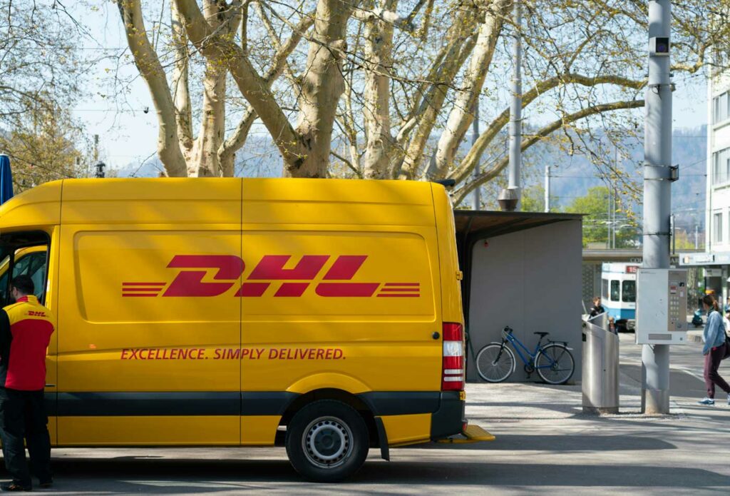 shows a yellow DHL van - courier insurance