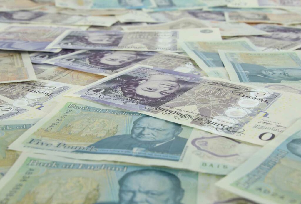 shows British notes laid on top of each other