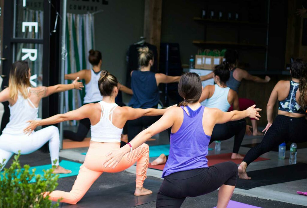 shows people doing yoga poses - yoga teacher insurance