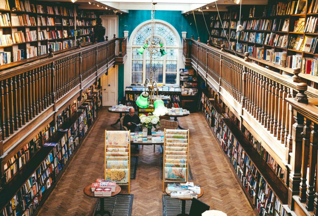 shows the inside of a bookstore - shop business insurance